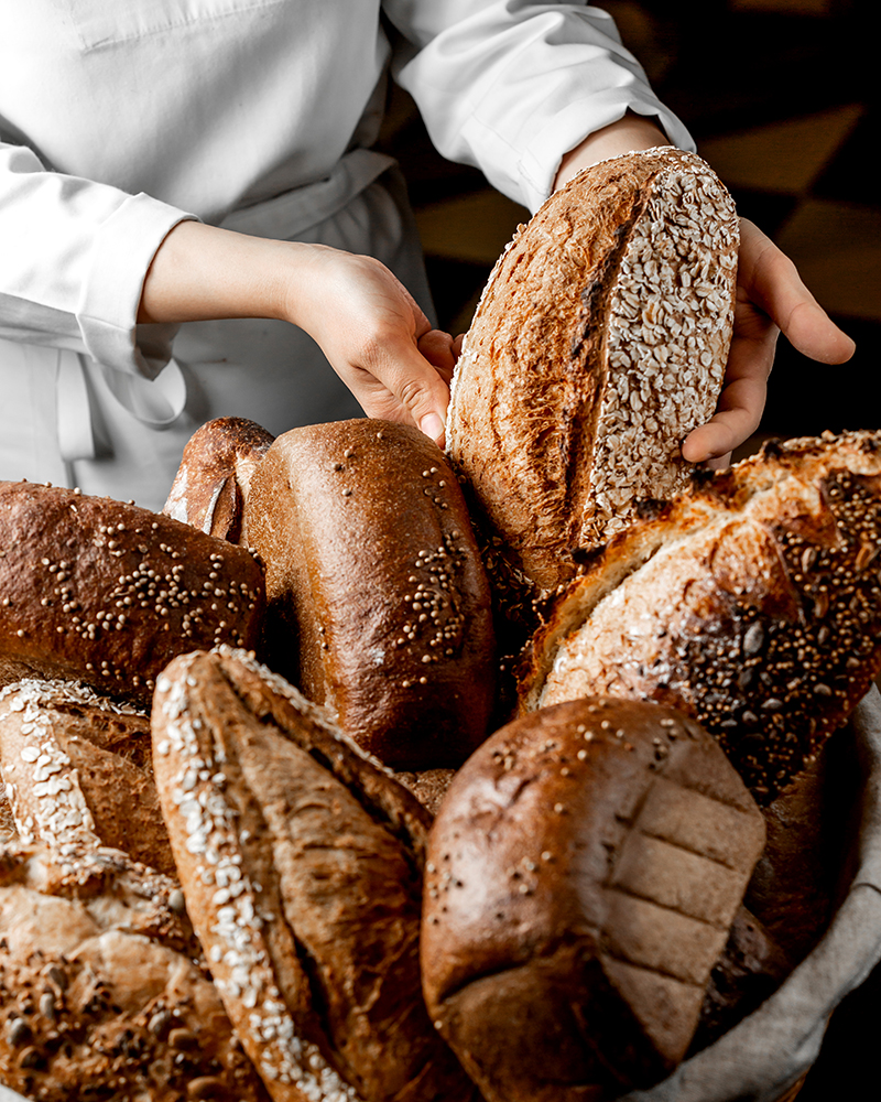 Baker displaying bread